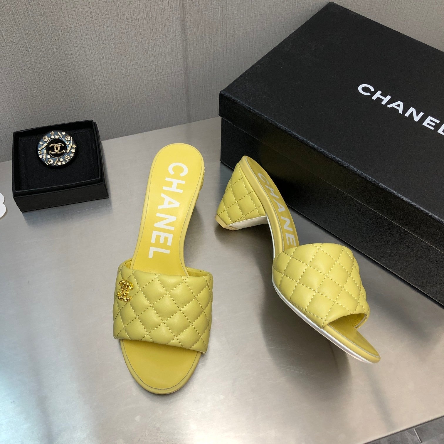 CHANEL DIAMOND-QUILTED 6 CM SANDALS IN BRIGHT YELLOW LAMBSKIN