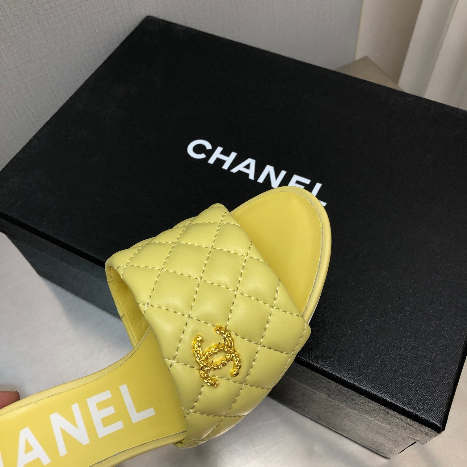 CHANEL DIAMOND-QUILTED 6 CM SANDALS IN BRIGHT YELLOW LAMBSKIN