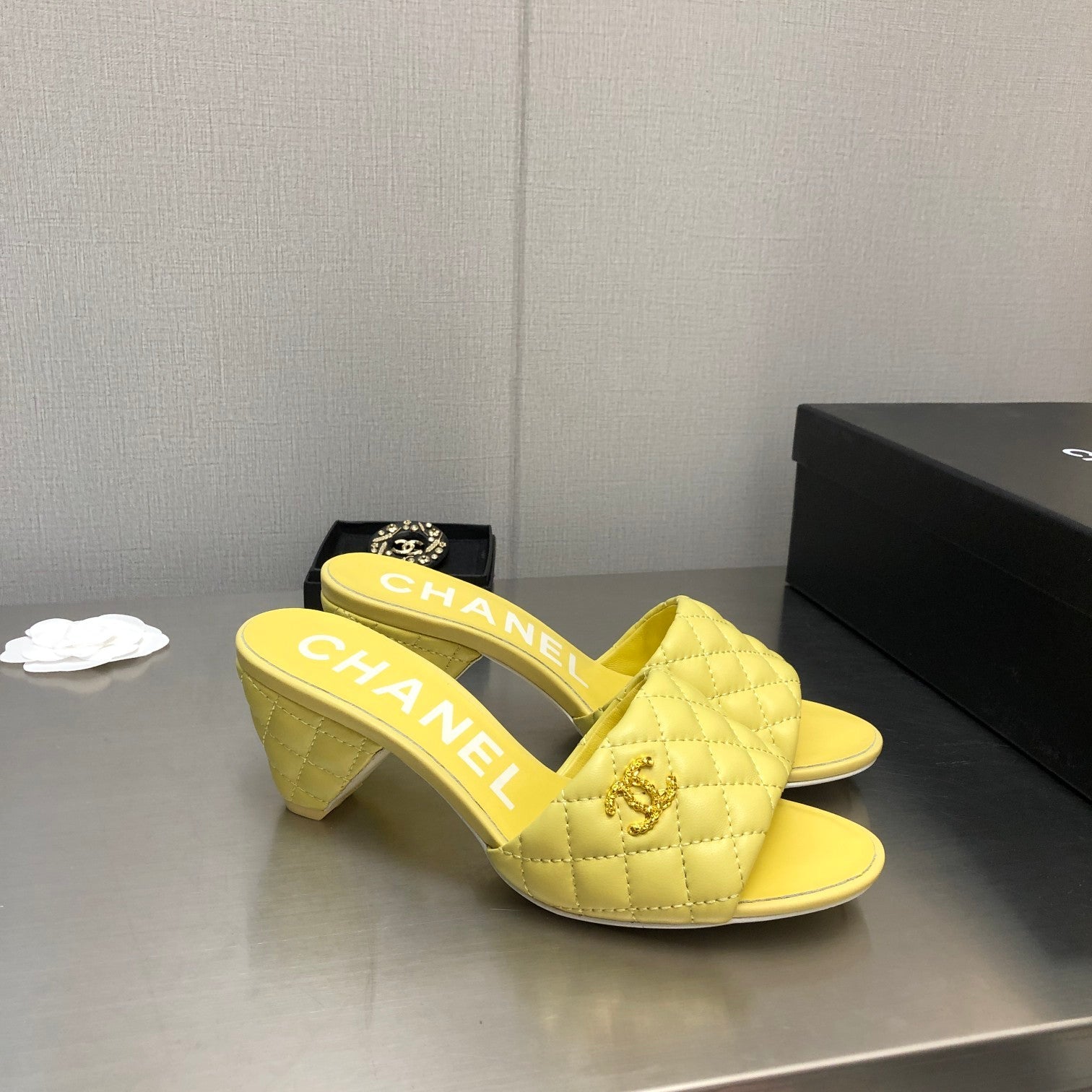 CHANEL DIAMOND-QUILTED 6 CM SANDALS IN BRIGHT YELLOW LAMBSKIN