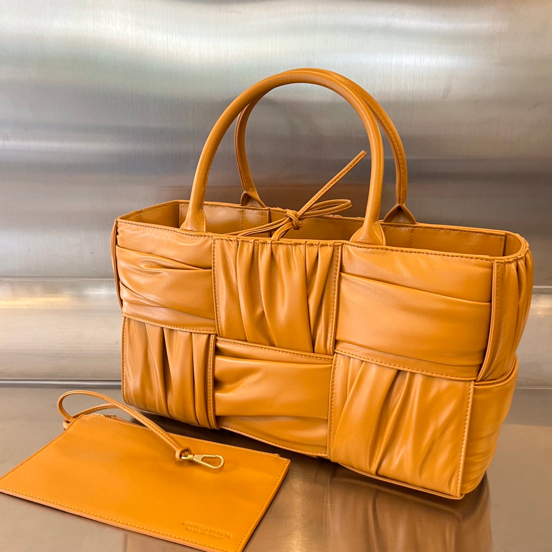 BOTTEGA VENETA SMALL ARCO TOTE 30 IN PIZAZZ ORANGE SOFT LAMBSKIN