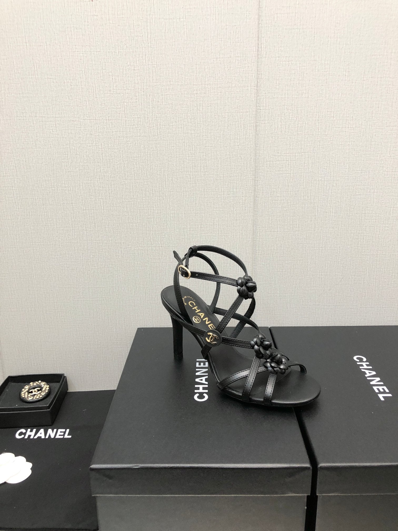 CHANEL FLORAL HIGH HEEL SANDAL IN BLACK LAMBSKIN
