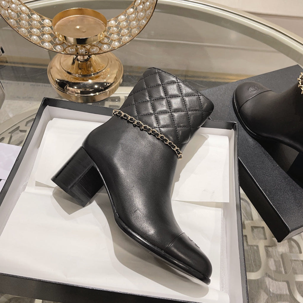 CHANEL MID-HEEL ANKLE BOOTS IN BLACK CALFSKIN
