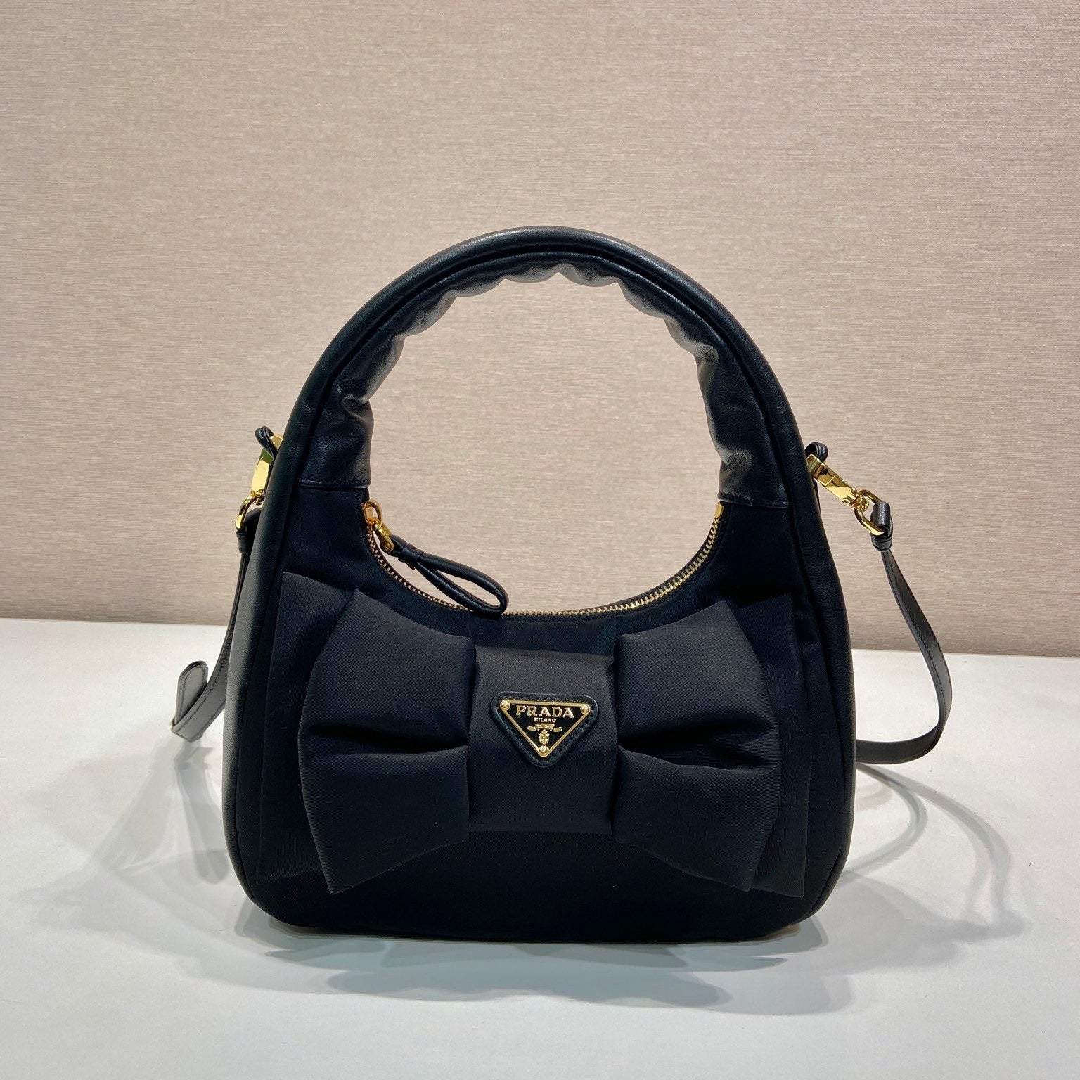 PRADA BOW HOBO BAG 22 IN BLACK RE-NYLON AND LAMBSKIN
