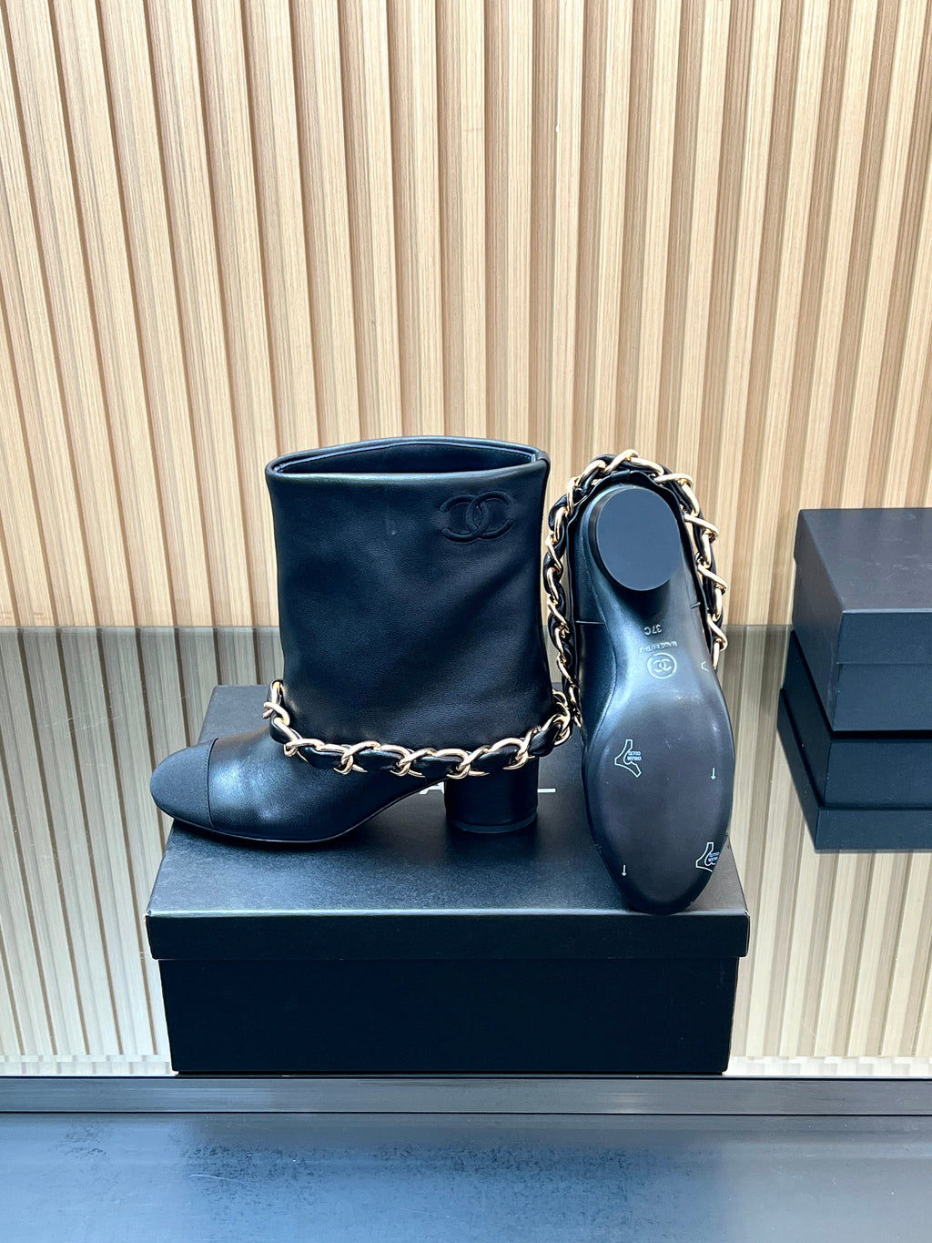 CHANEL 25S LOW BOOTS 65MM IN BLACK CALFSKIN GOLD HARDWARE