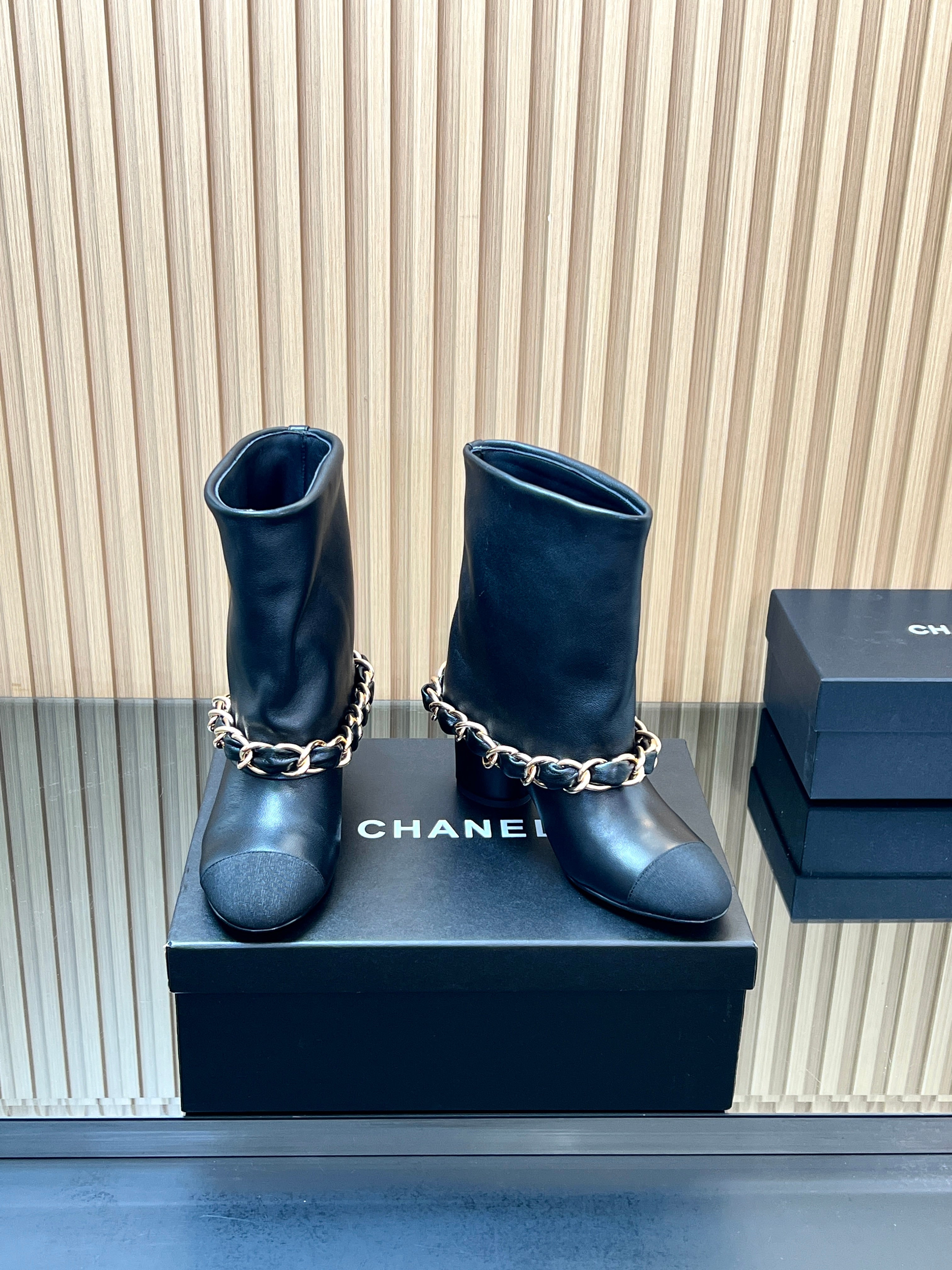 CHANEL 25S LOW BOOTS 65MM IN BLACK CALFSKIN GOLD HARDWARE