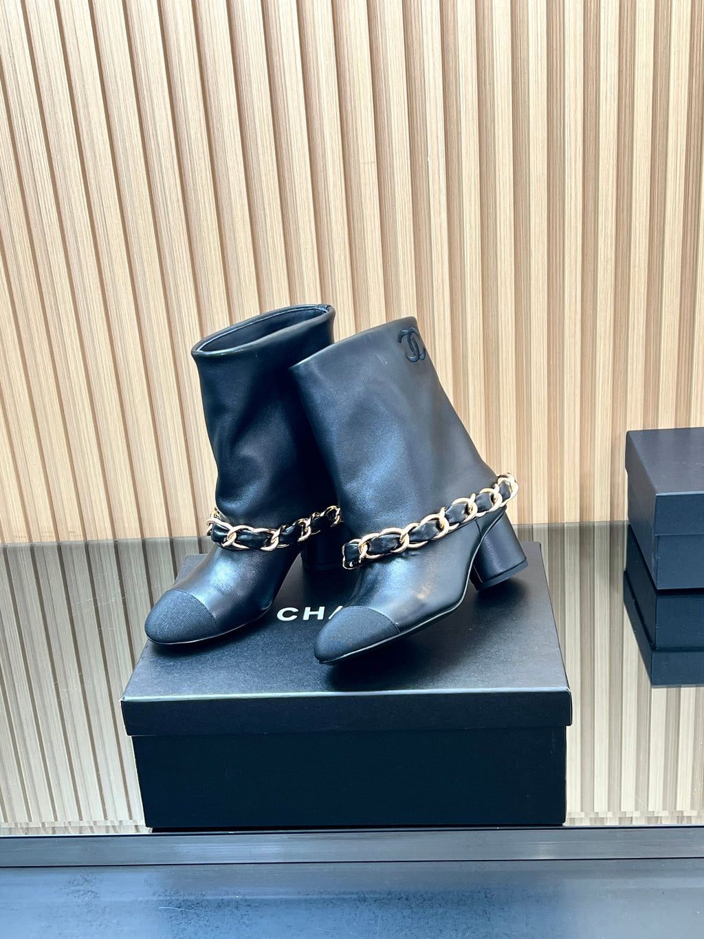 CHANEL 25S LOW BOOTS 65MM IN BLACK CALFSKIN GOLD HARDWARE
