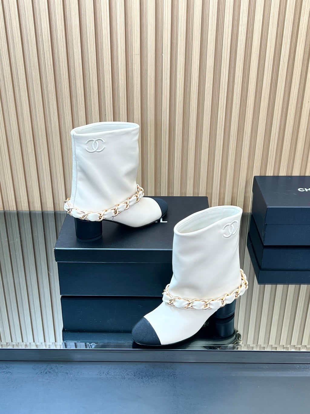 CHANEL 25S LOW BOOTS 65MM IN WHITE CALFSKIN GOLD HARDWARE
