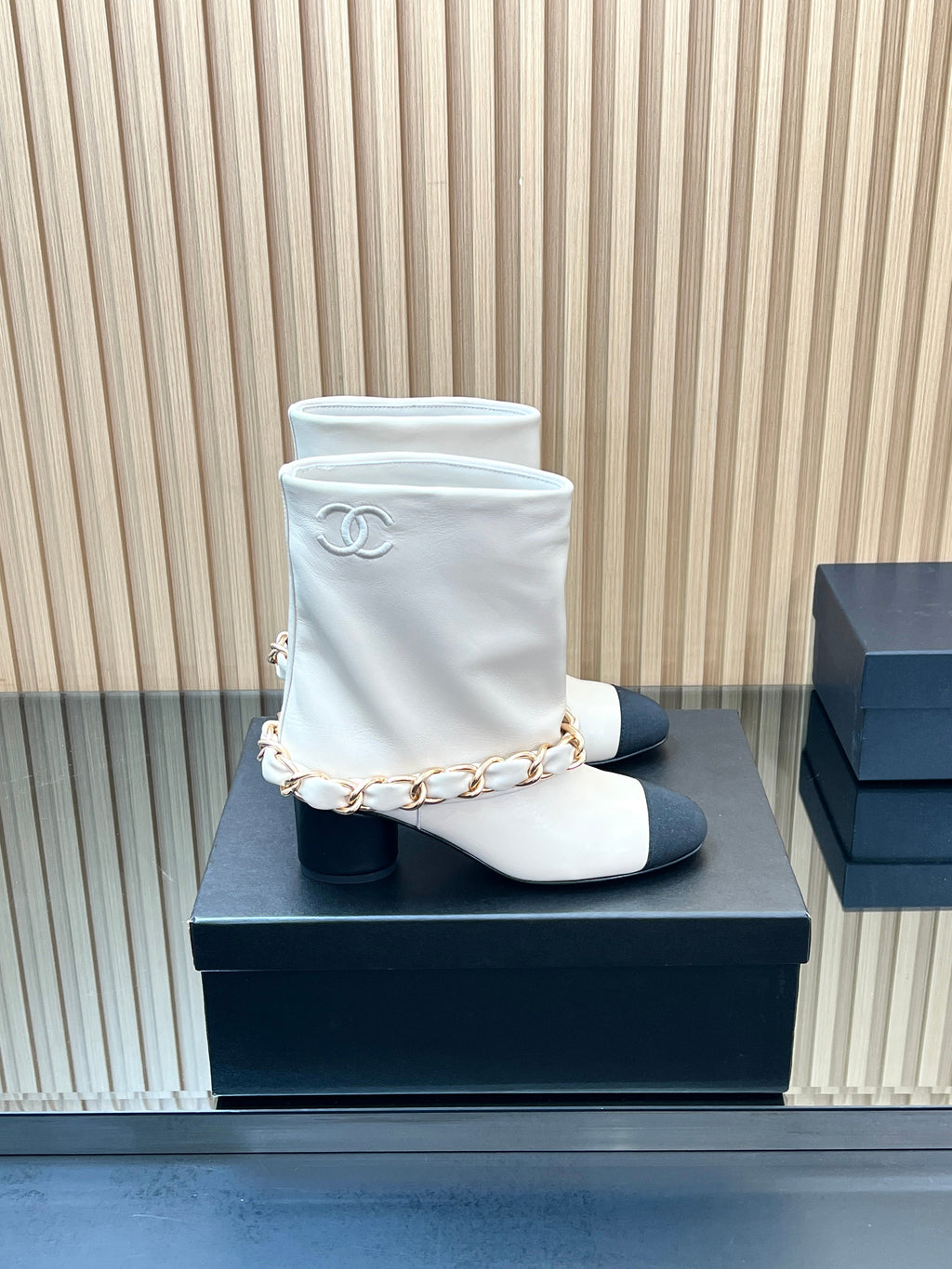 CHANEL 25S LOW BOOTS 65MM IN WHITE CALFSKIN GOLD HARDWARE