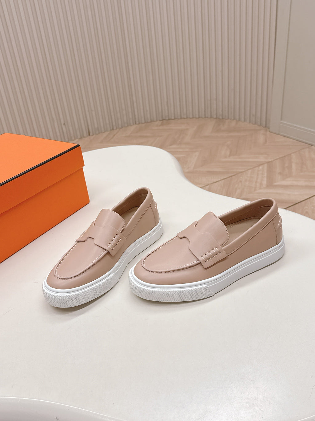 HERMES 25S SLIP-ON IN SOFT NUDE PINK LAMBSKIN