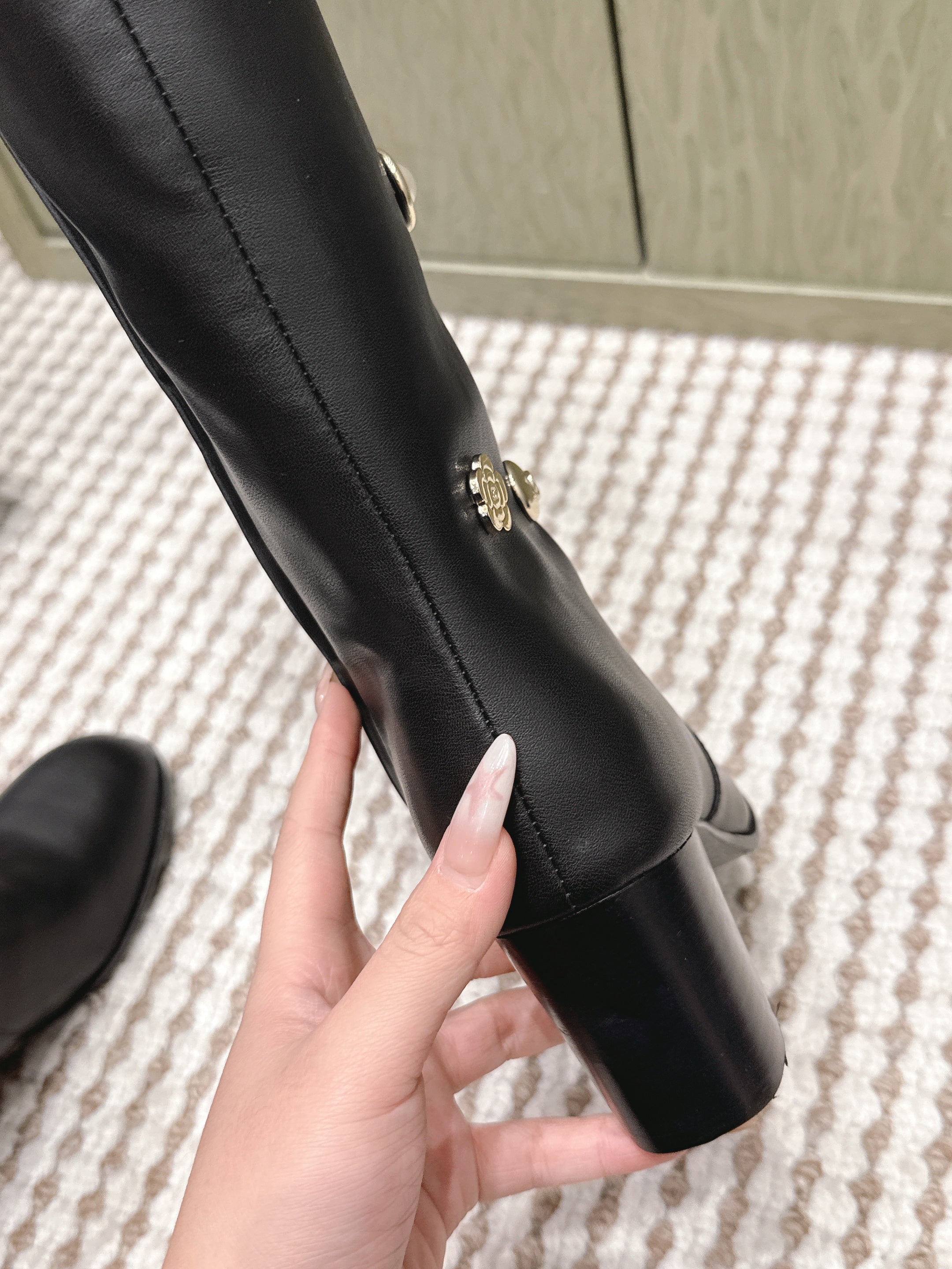 CHANEL 25S KNEE-HIGH BOOTS IN BLACK CALFSKIN WITH RHINESTONES