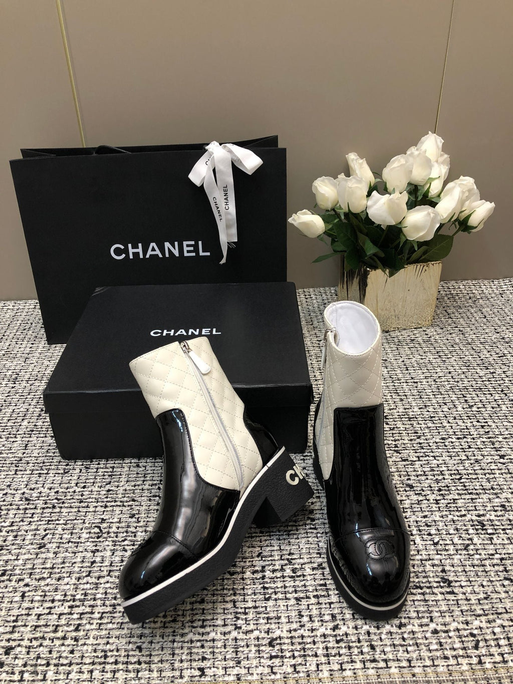 CHANEL ROUND-TOE SHORT BOOTS BLACK MIX WHITE SHEEPSKIN