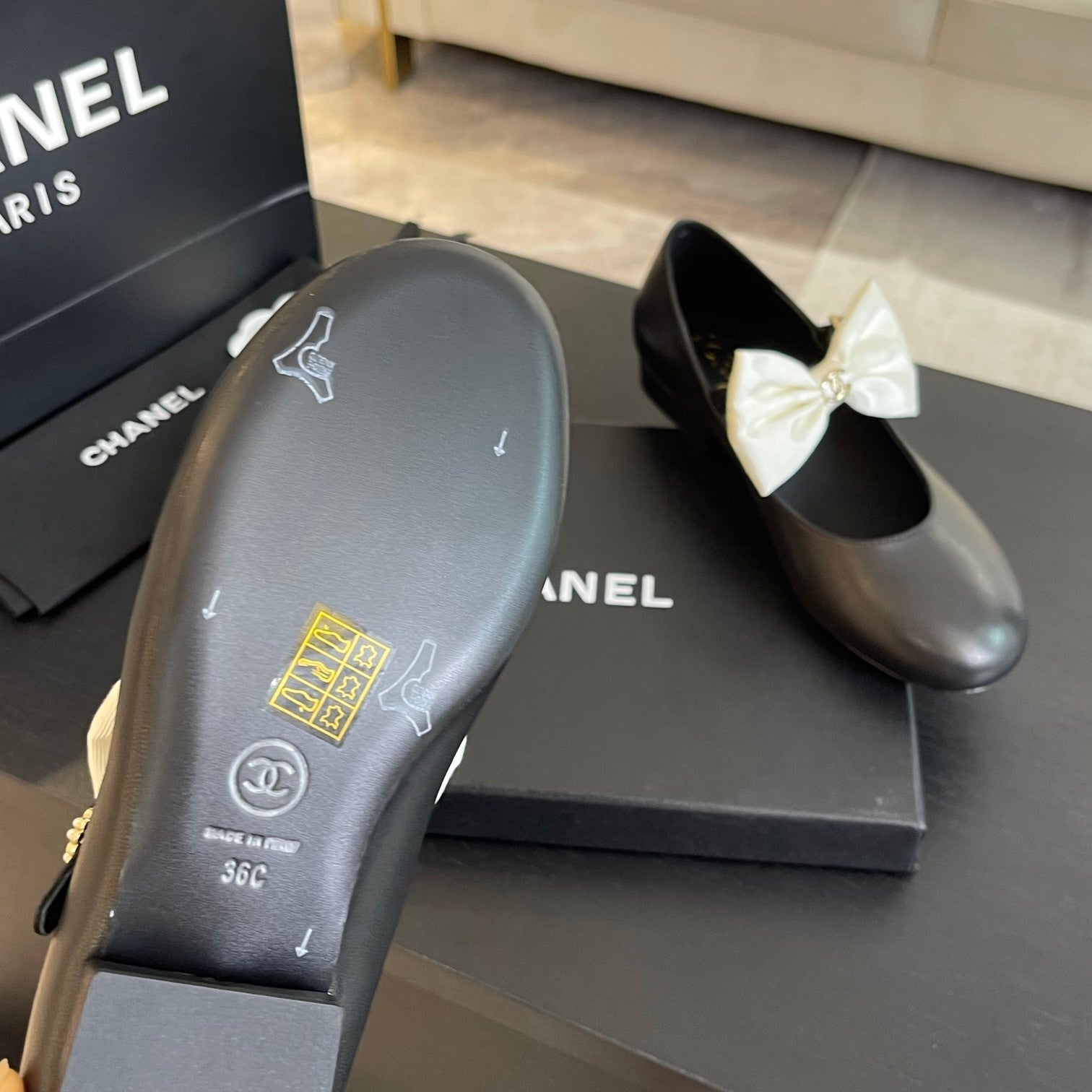 CHANEL BALLET FLAT BLACK LAMBSKIN WITH WHITE BOW