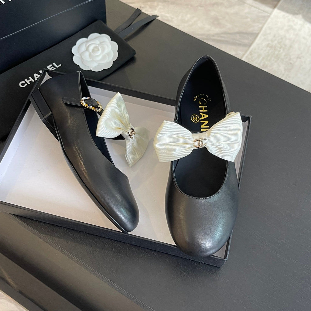 CHANEL BALLET FLAT BLACK LAMBSKIN WITH WHITE BOW