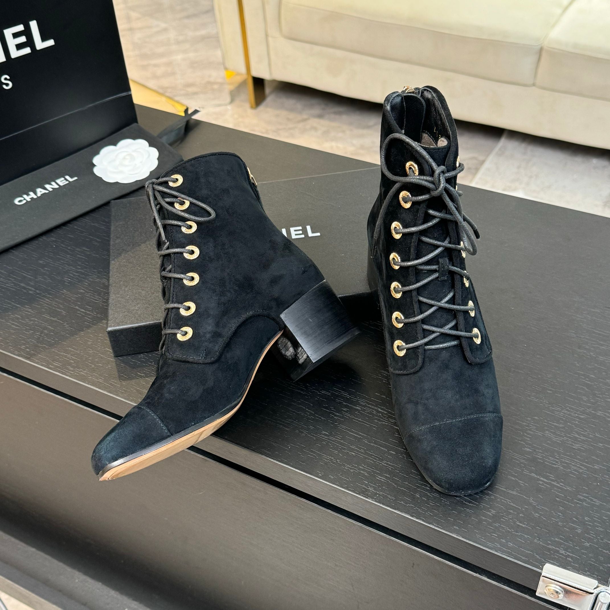 CHANEL LACE-UP SHORT BOOTS IN BLACK SUEDE