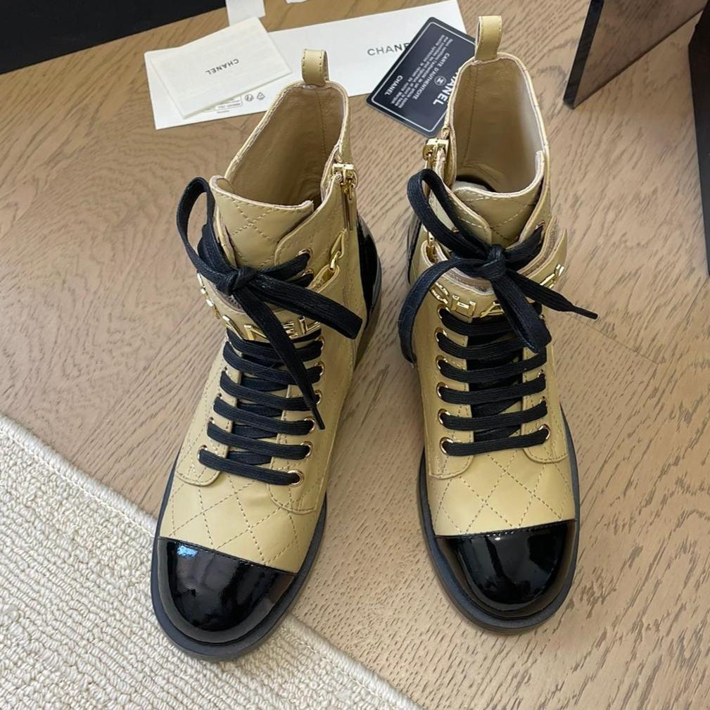 CHANEL ALPHABET MARTIN BOOTS IN FLAX YELLOW LAMBSKIN