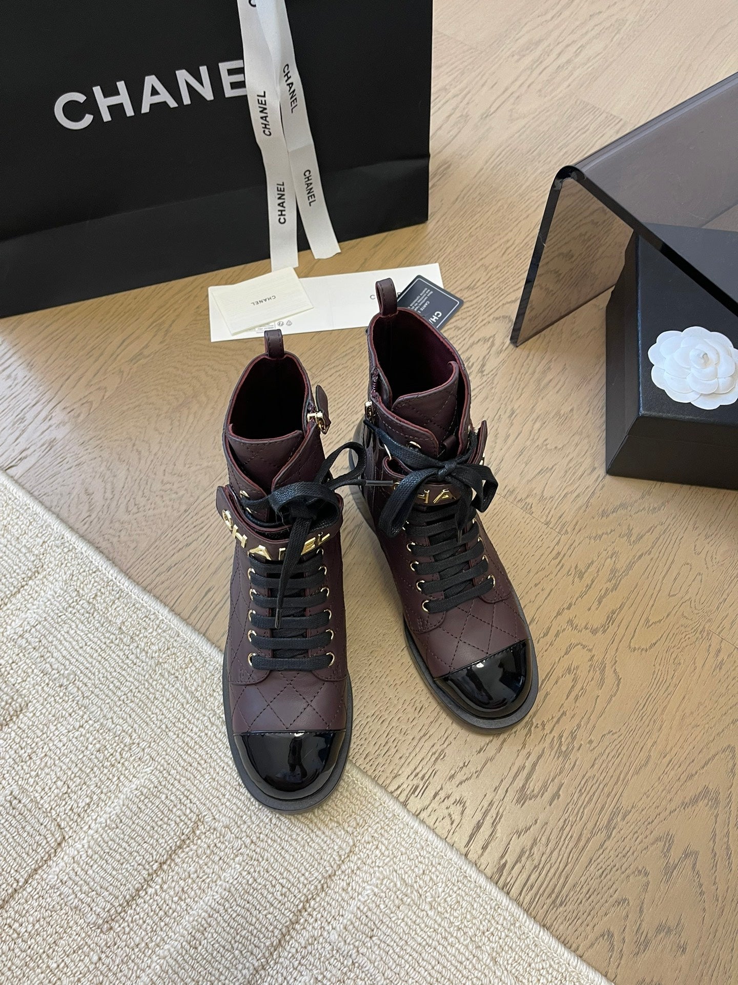 CHANEL ALPHABET MARTIN BOOTS IN BRUNETTE BROWN MIX BLACK LAMBSKIN