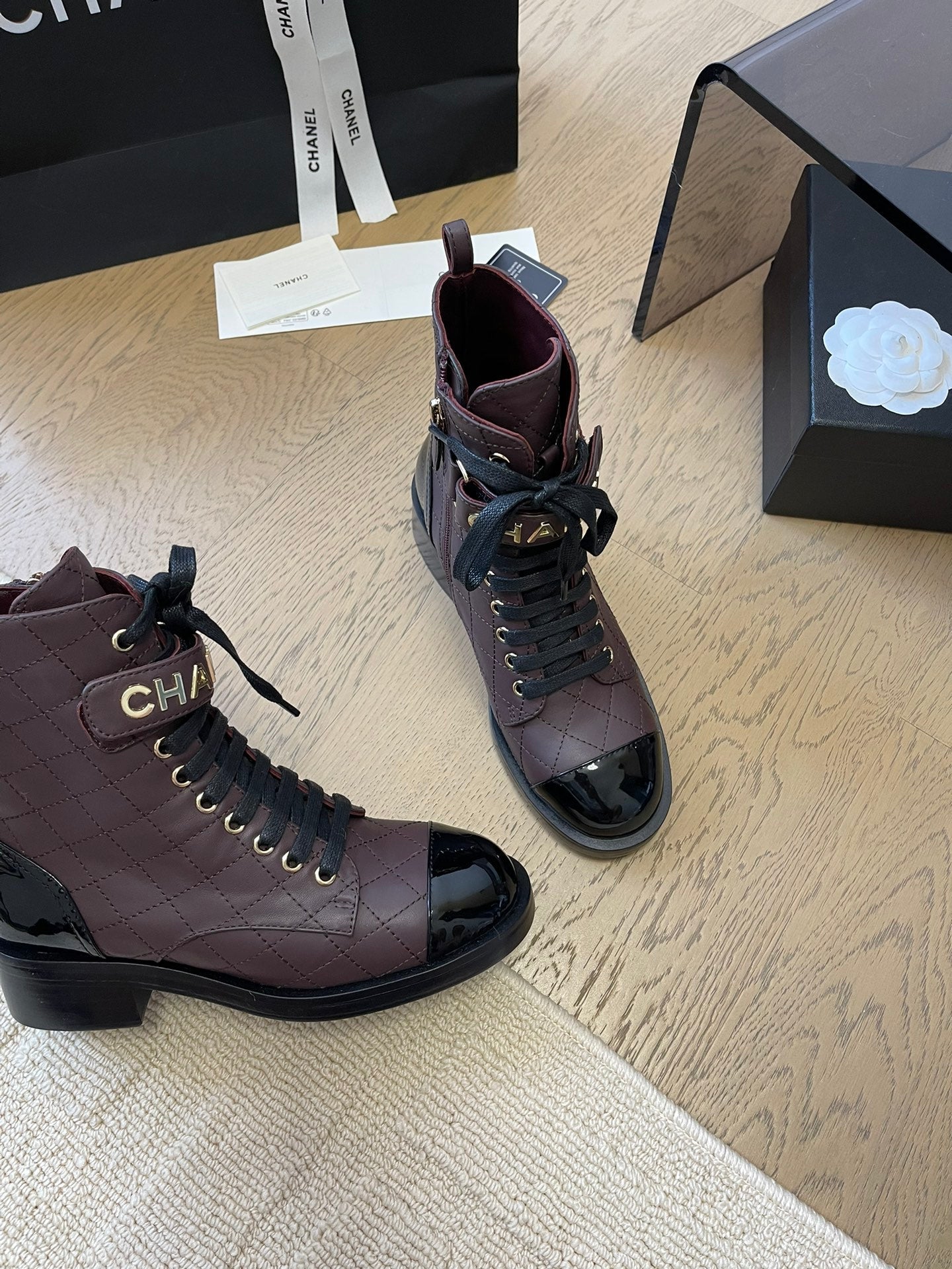 CHANEL ALPHABET MARTIN BOOTS IN BRUNETTE BROWN MIX BLACK LAMBSKIN