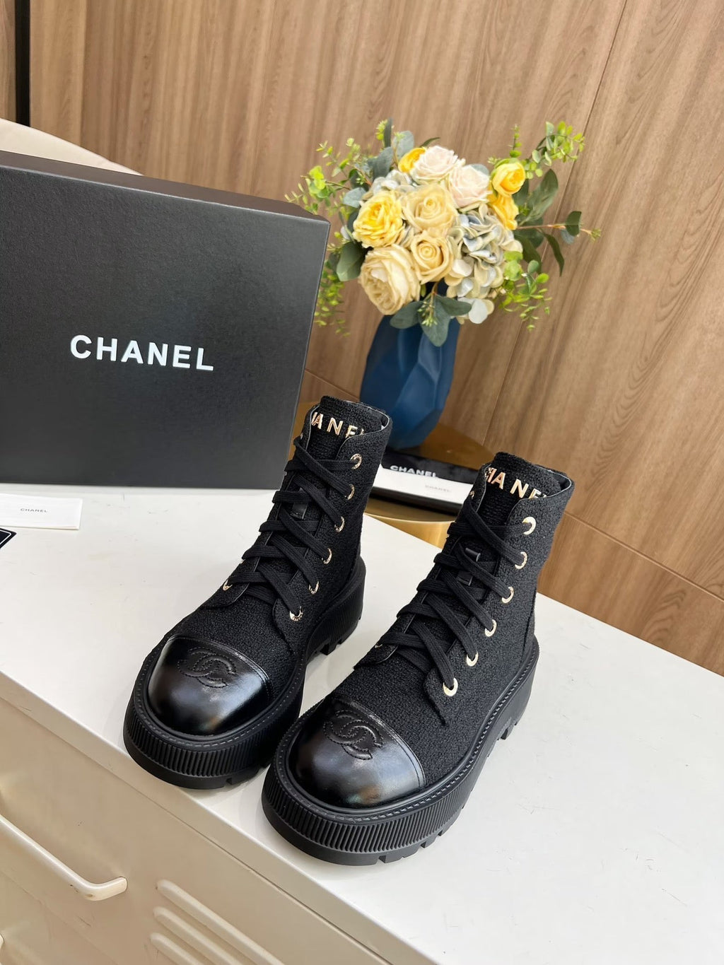 CHANEL SHORT BOOTS IN BLACK TWEED AND CALFSKIN