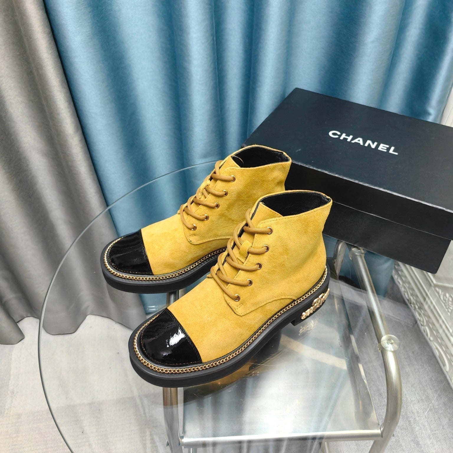 CHANEL SHORT BOOTS IN GOLD YELLOW SUEDE AND BLACK SHEEPSKIN