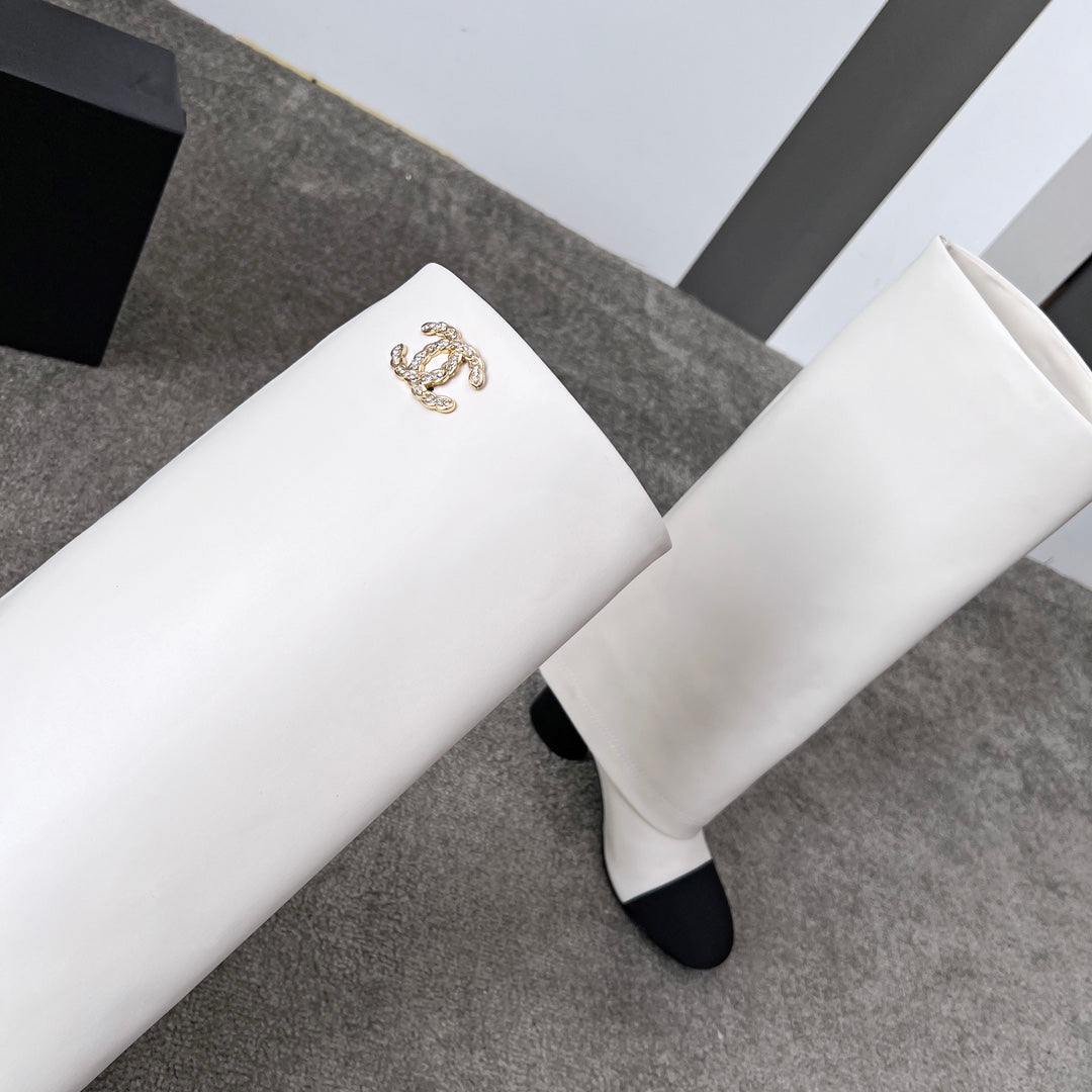 CHANEL 25S HIGH BOOTS 55MM IN IVORY BLACK CALFSKIN AND CANVAS GOLD HARDWARE