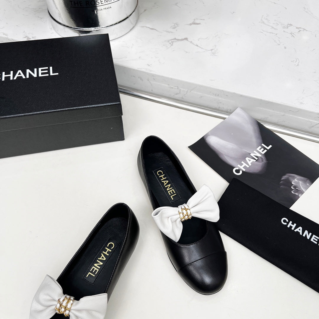 CHANEL 25S MARY JANES IN BLACK CALFSKIN WITH WHITE BOW GOLD HARDWARE