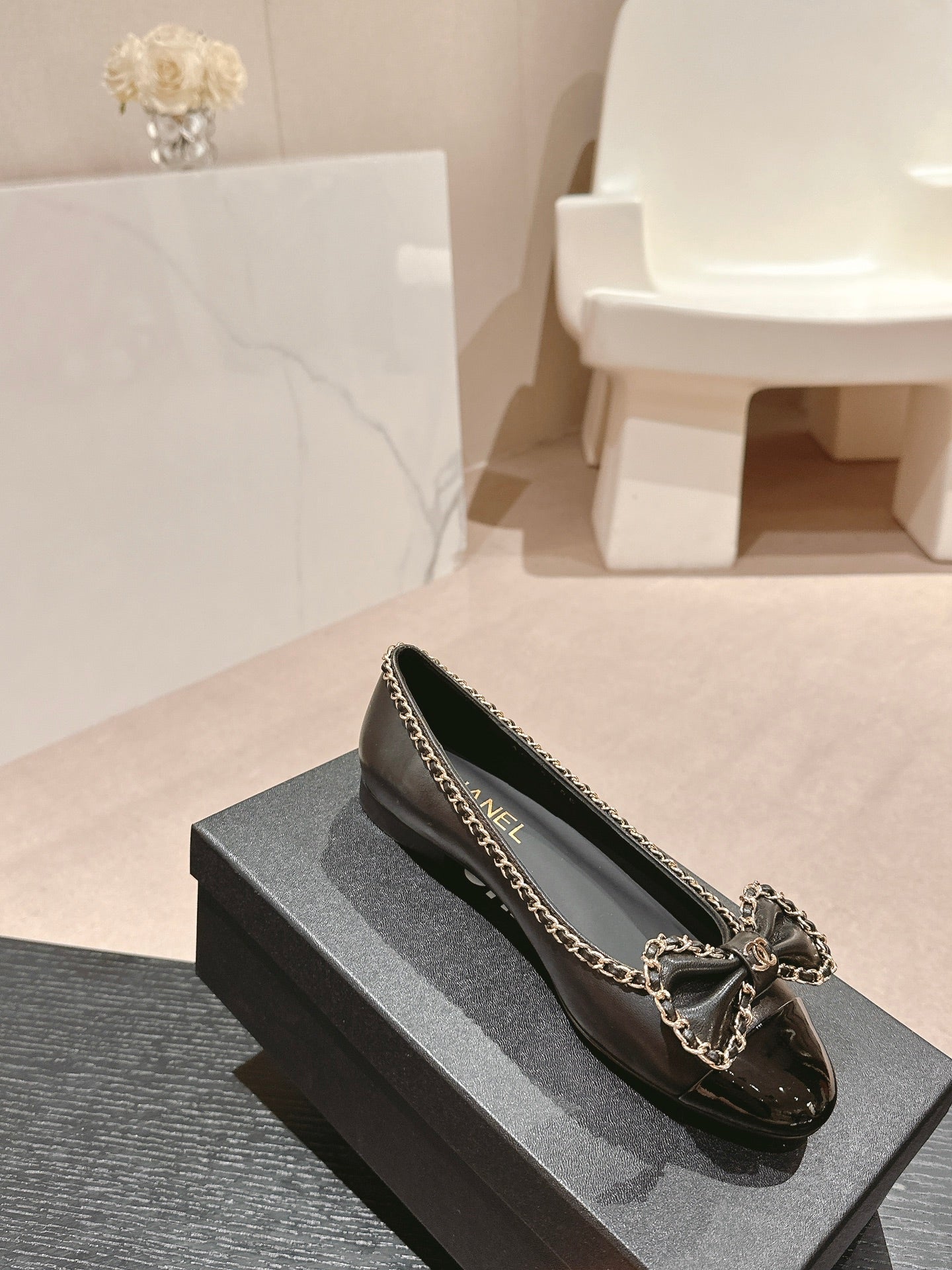 CHANEL BOWKNOT BALLET FLAT IN BLACK SHEEPSKIN