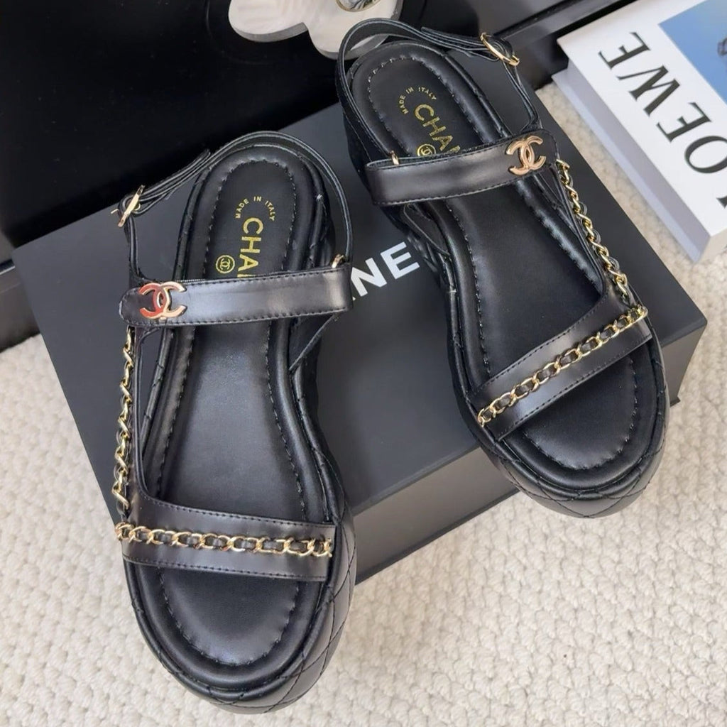 CHANEL THICK-SOLED SANDALS 55 MM IN BLACK CALFSKIN