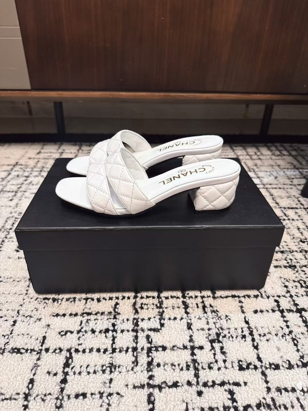 CHANEL MID HEEL MULES IN WHITE SHEEPSKIN