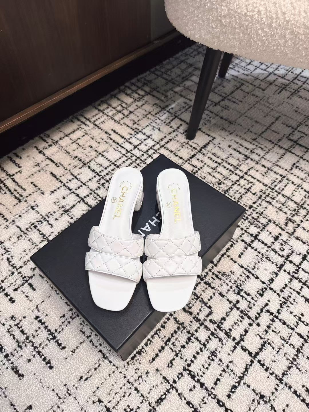 CHANEL MID HEEL MULES IN WHITE SHEEPSKIN