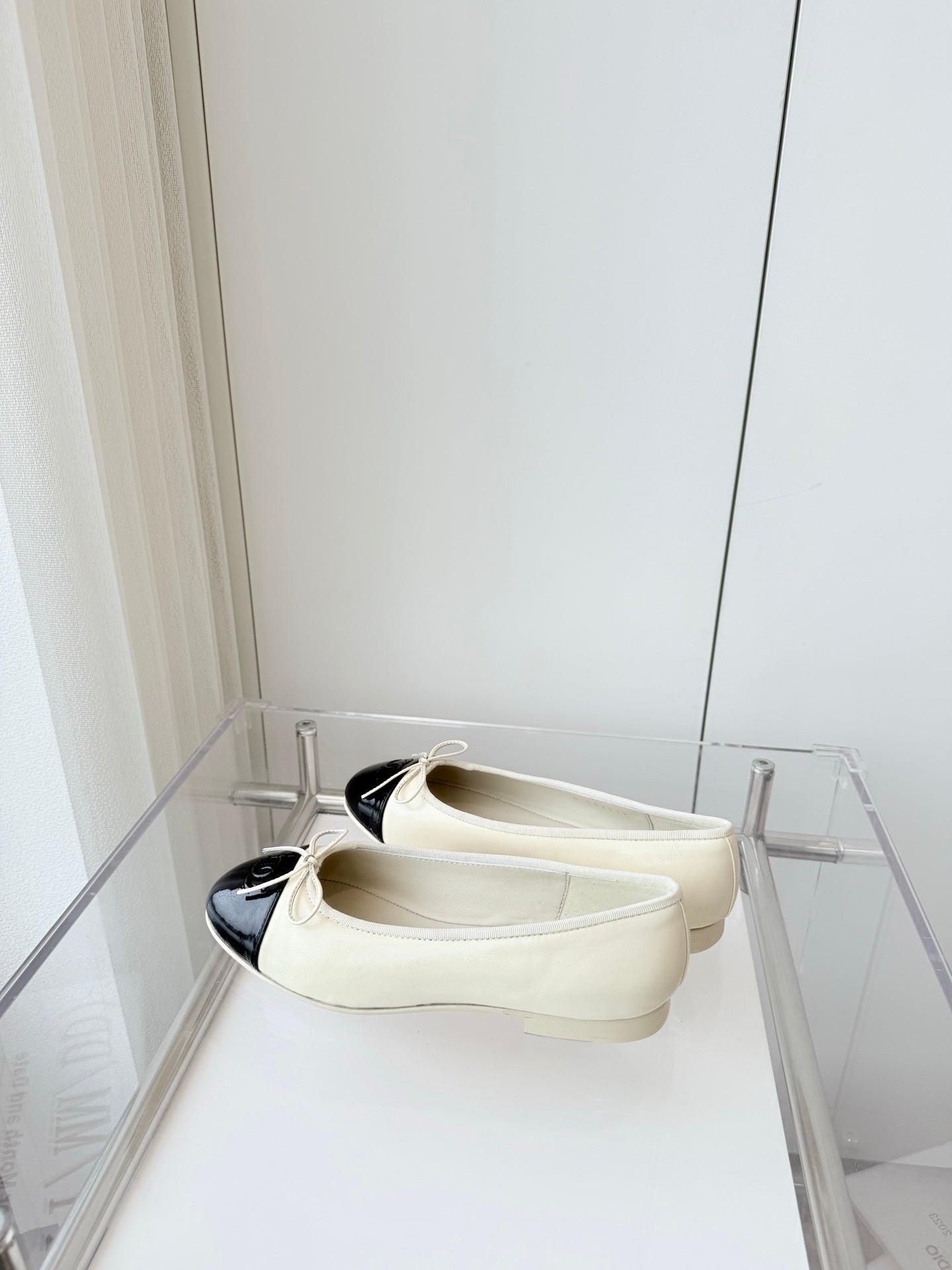 CHANEL BALLET FLAT IN WHITE MIX BLACK CALFSKIN